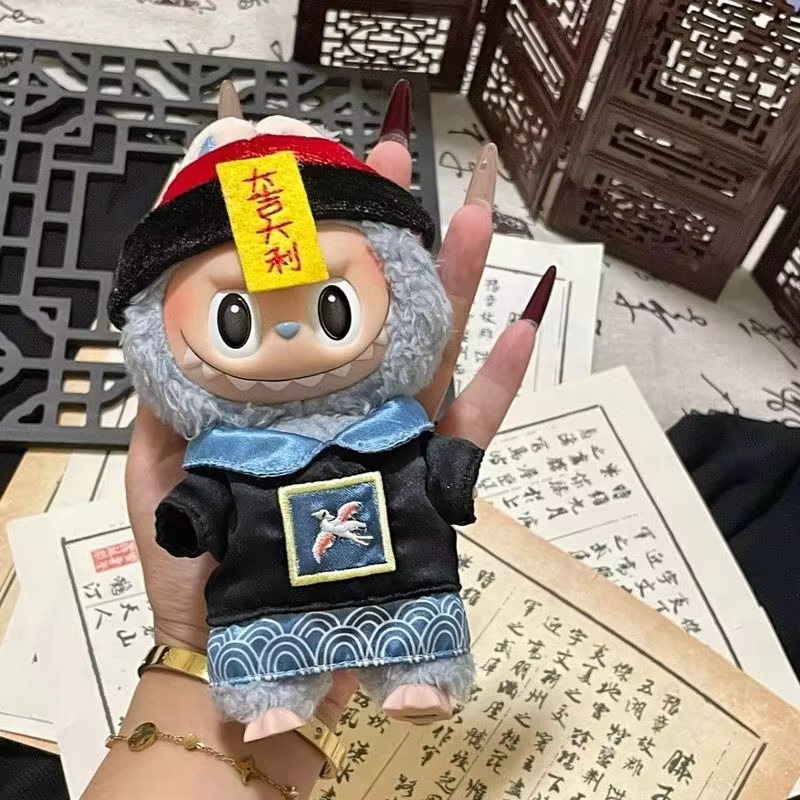 Available to purchase is a set that includes an adorable 17cm doll pendant, Dolly, a cheeky Fun Big Kedah Zombie outfit, a splattering of stylish Lafufu clothes, and an assortment of changing toys