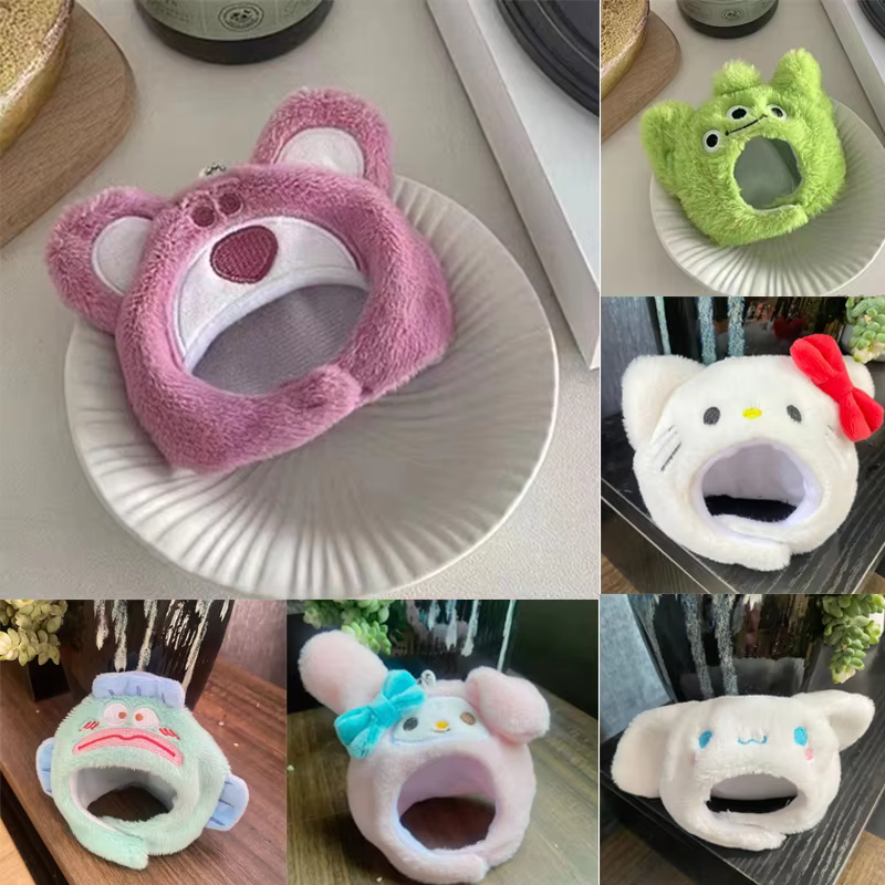 The Sanrio Collection consists of the Doll Head Cover, Lafufu Doll Clothes, Kurome Plush 10-15cm, and the Sun Fish three-eyed accessory for the Atarashi Hello Kitty Taiyaki